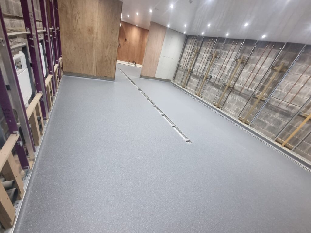 Bonded polymer modified screed - North Wales campsite